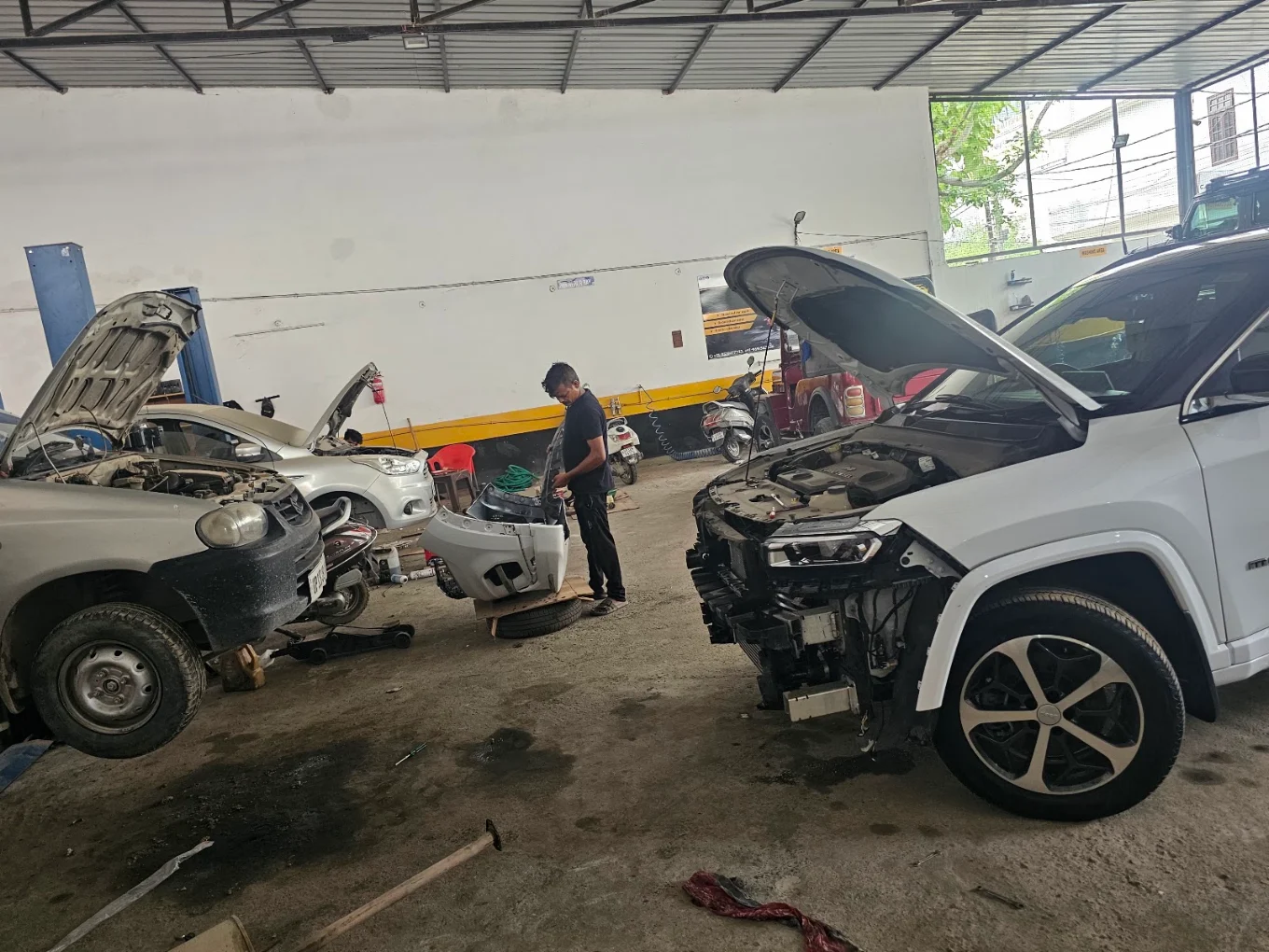 Vehicle repair work at CARKHANA
